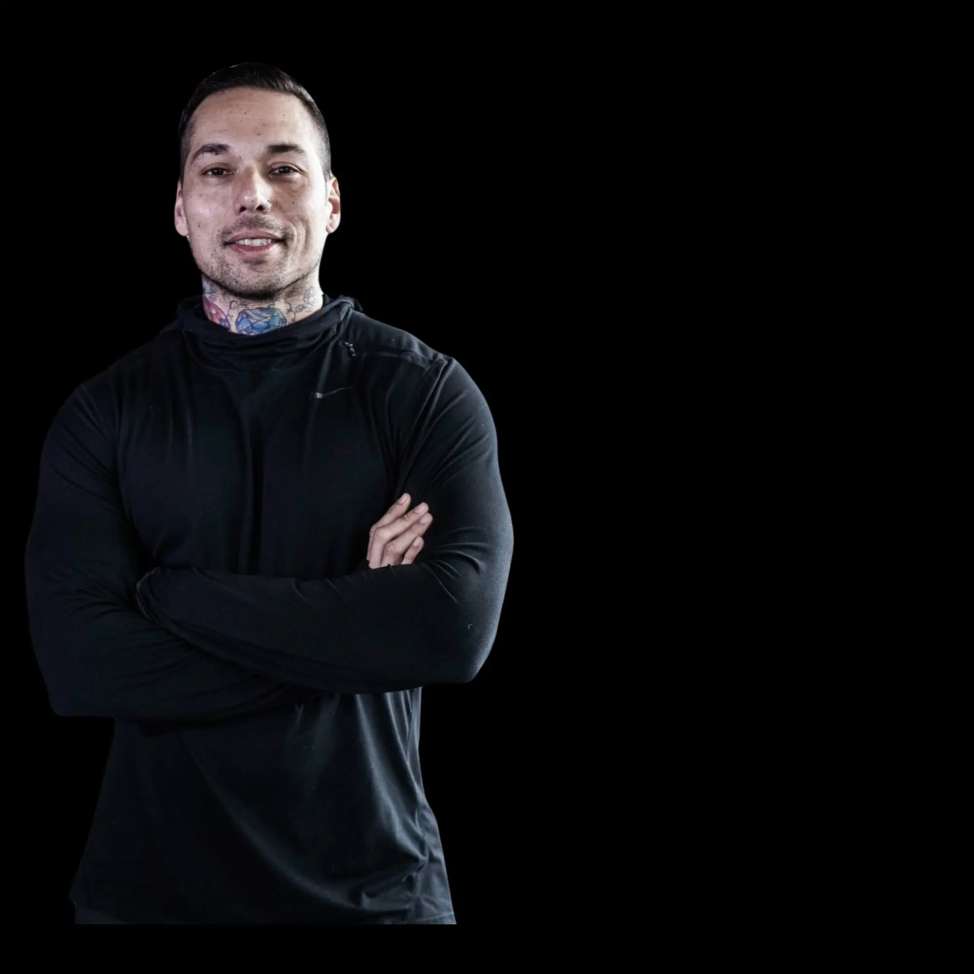 Trainer smiling confidently after a workout session.
