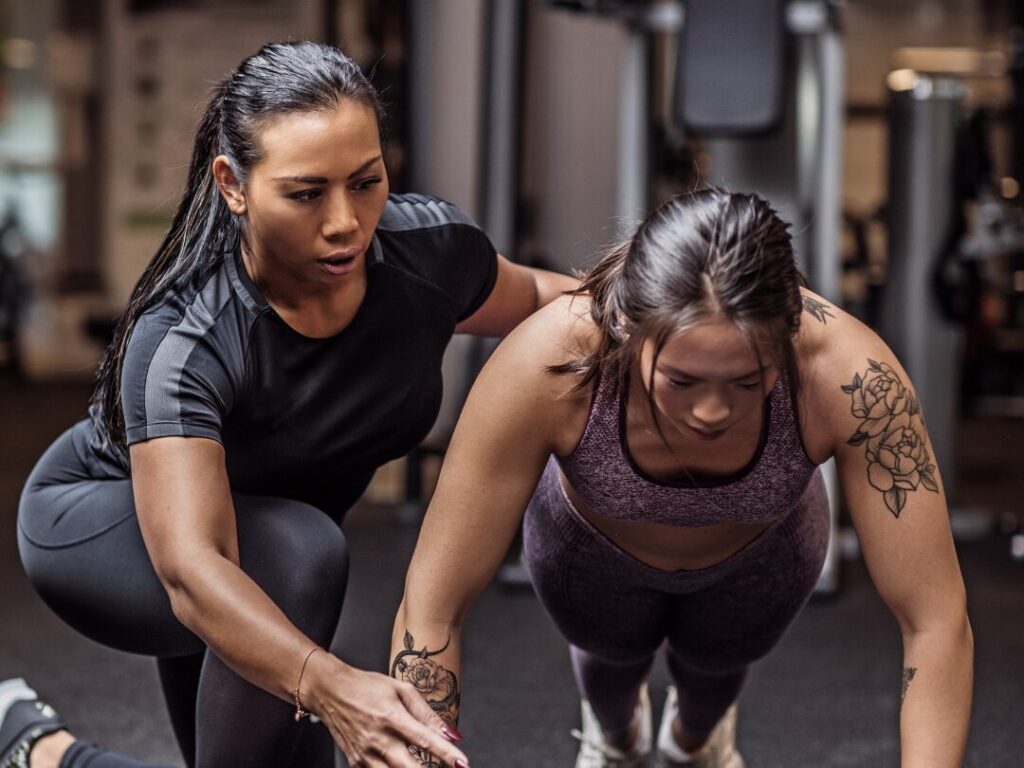 Personal Trainer working with a client