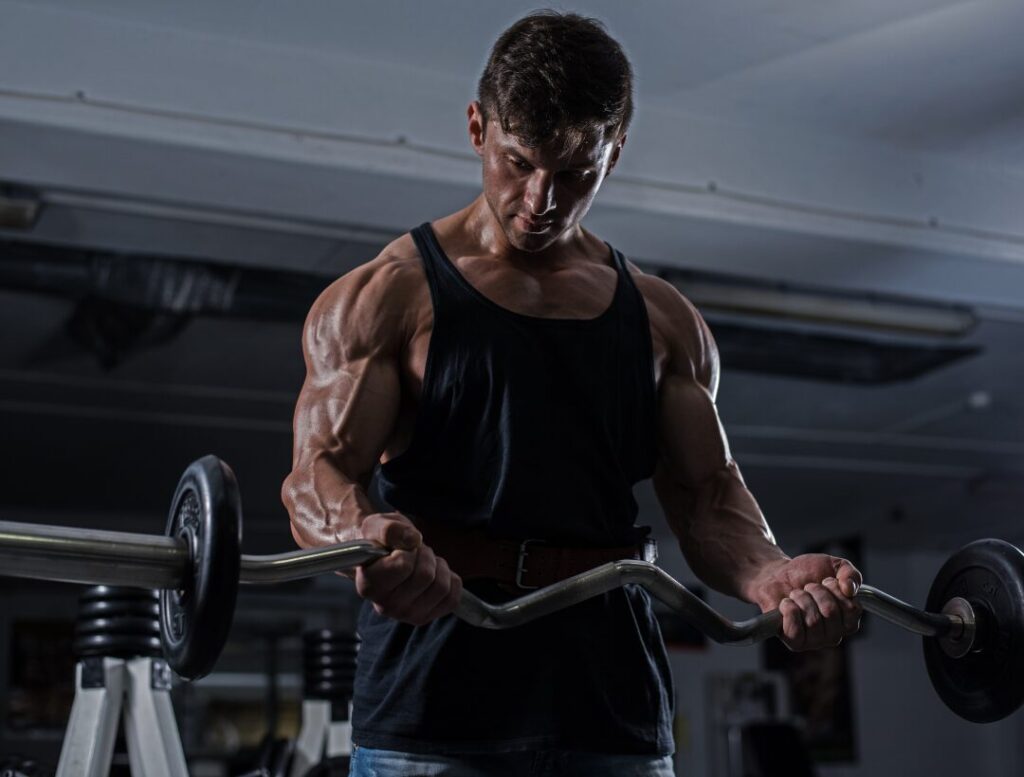 man performing dumbbell workout strength training