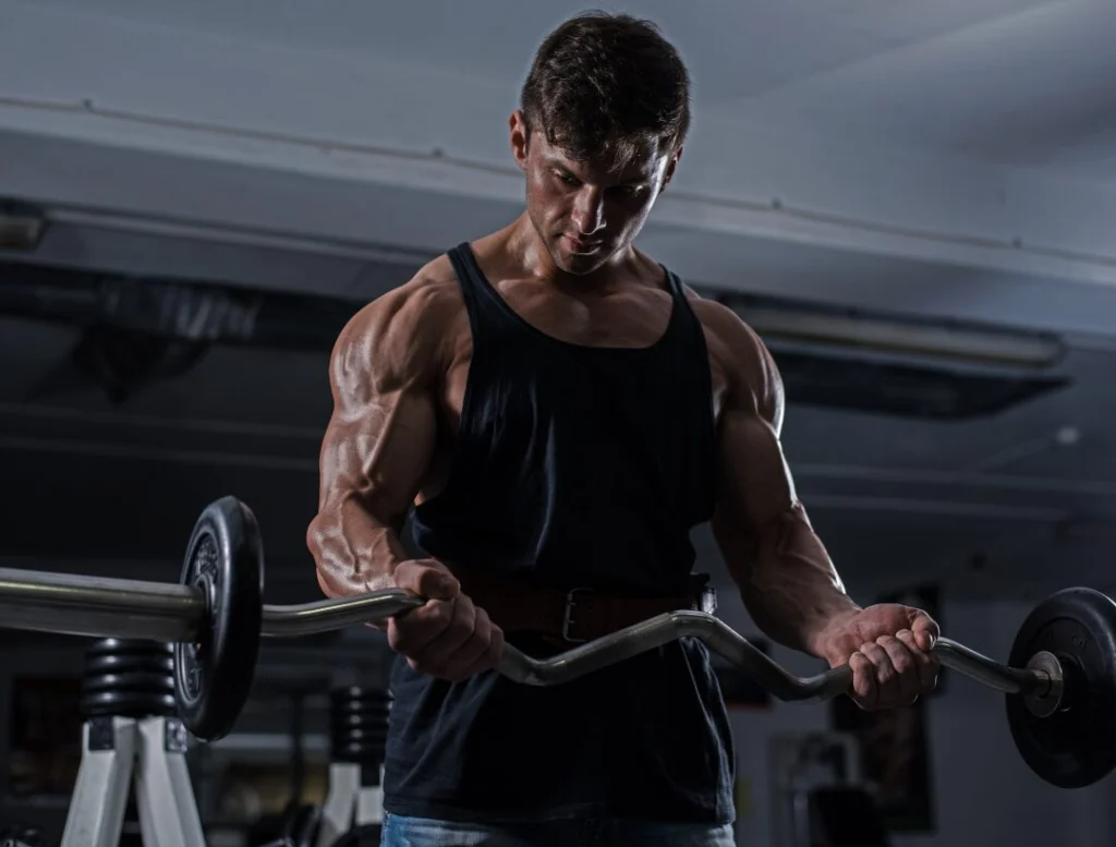 man performing dumbbell workout strength training