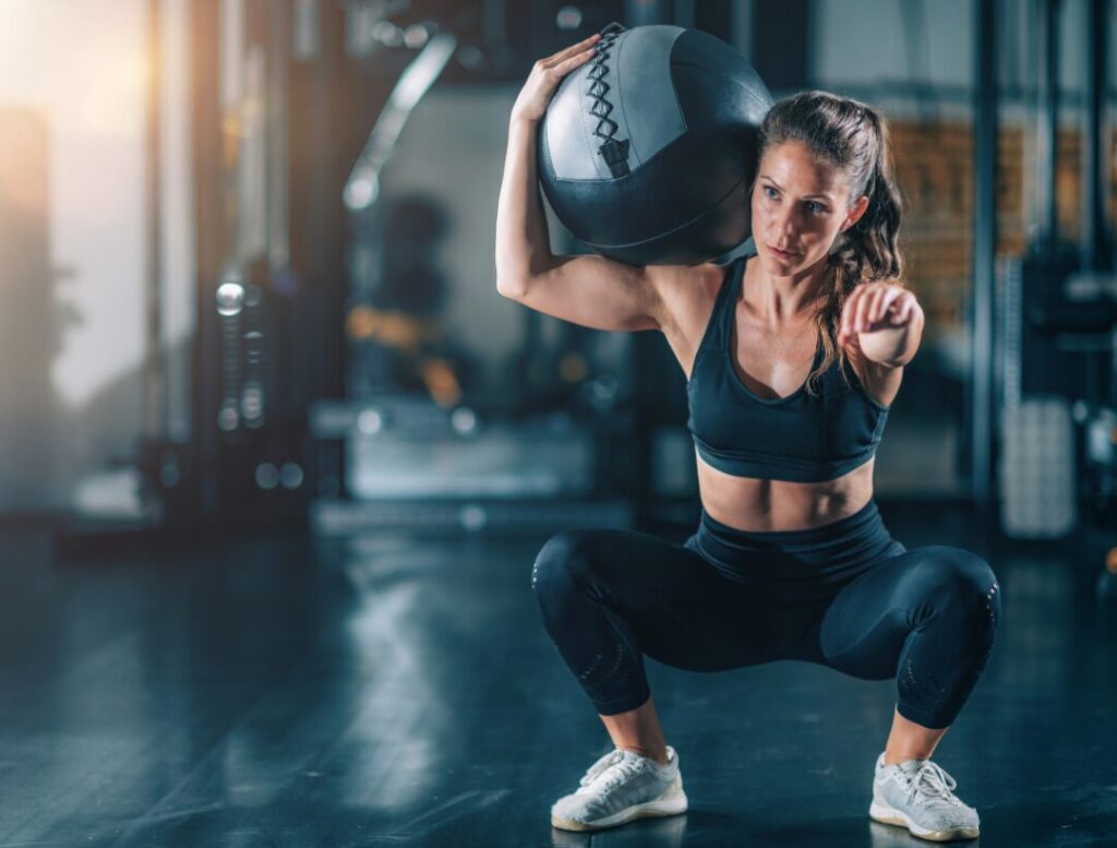 Woman doing uni lateral squat