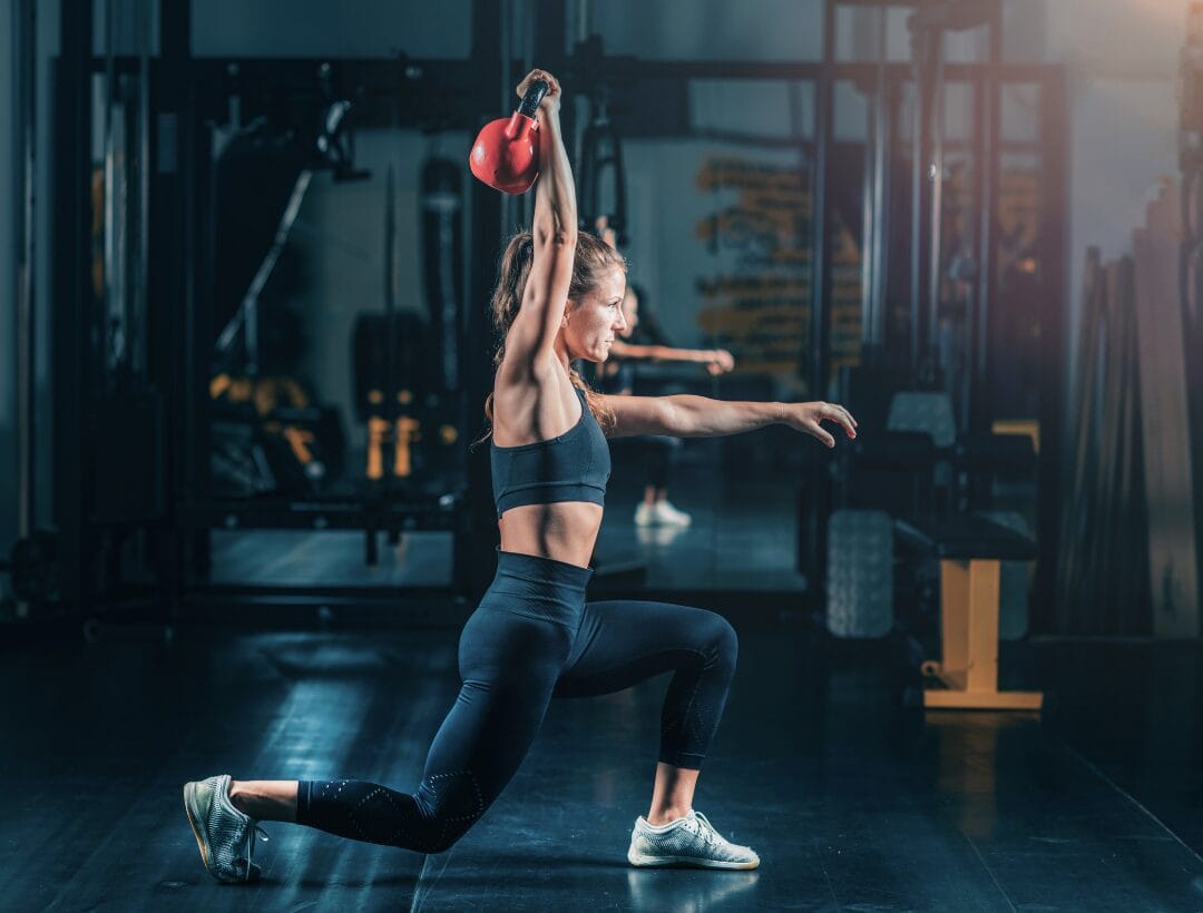 woman doing over head lunge