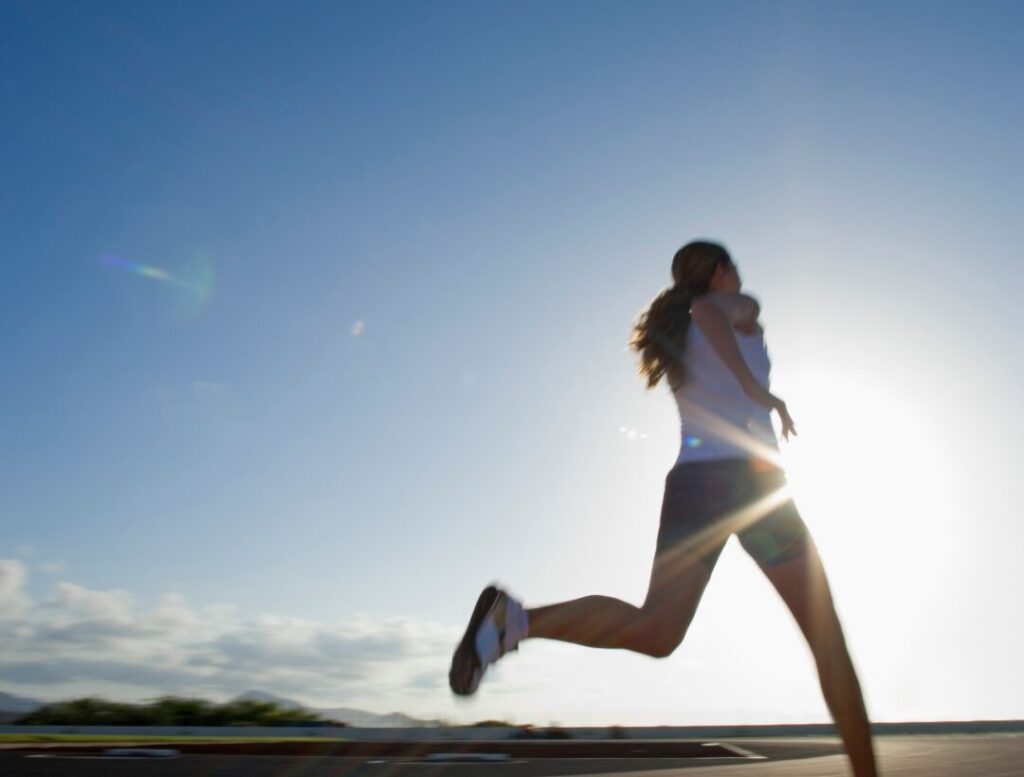 woman running outdoors fitness training
