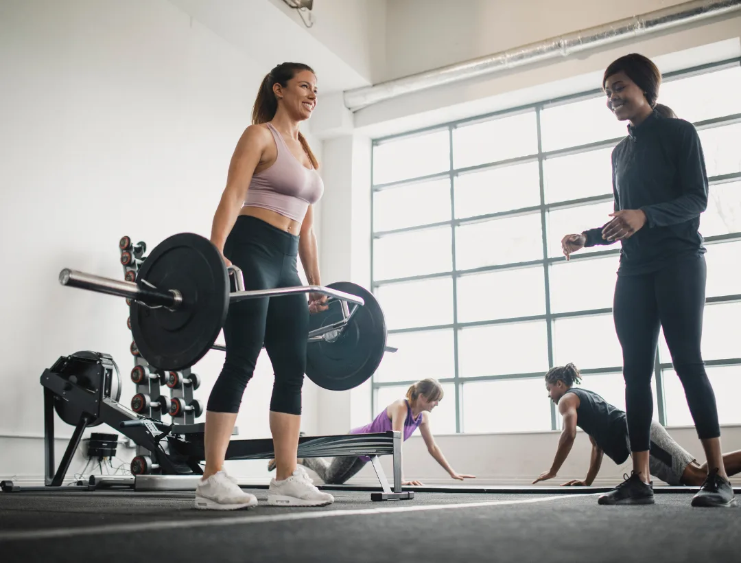 Woman doing a trap bar deadlift